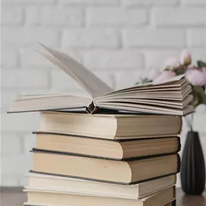 arrangement-with-books-stack-indoors.jpg